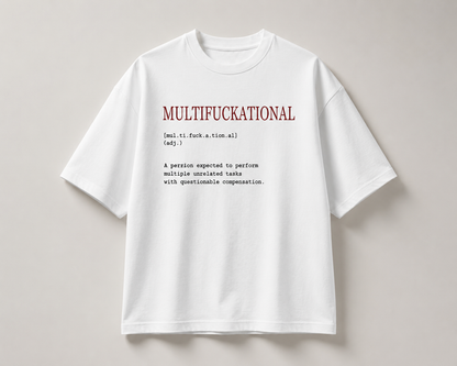 A white short-sleeve t-shirt with a humorous dictionary-style definition printed on the chest, displayed flat against a neutral light gray background.